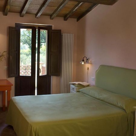 Aparthotel Borgo Le Capannelle Castel Ritaldi Habitación foto