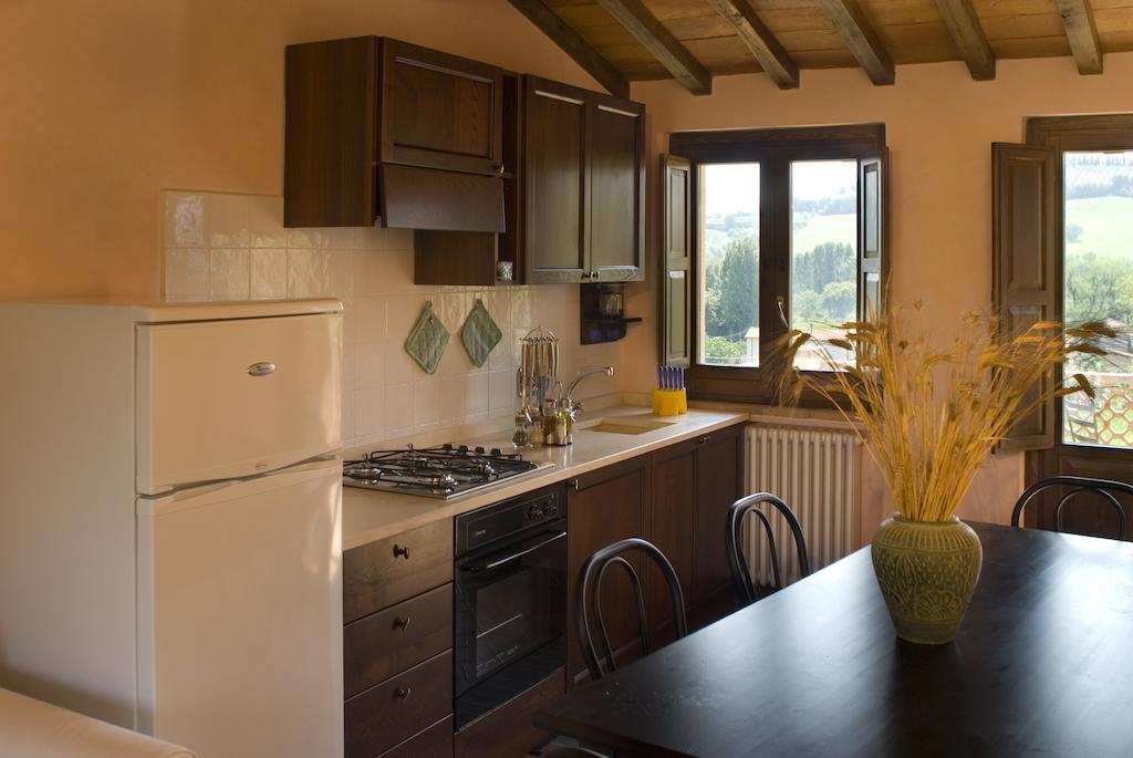 Aparthotel Borgo Le Capannelle Castel Ritaldi Habitación foto